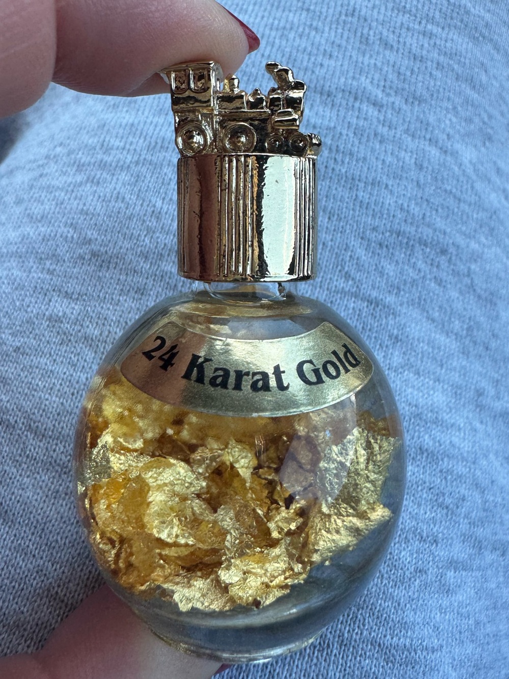 Gold Flake 24K Souvenir Bottle with Train Top